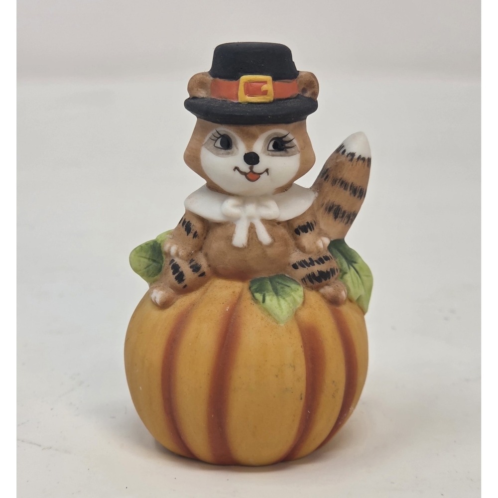 Vintage Bisque Pilgrim Raccoon Figurine Sitting on Pumpkin Fall Harvest Decor 3"